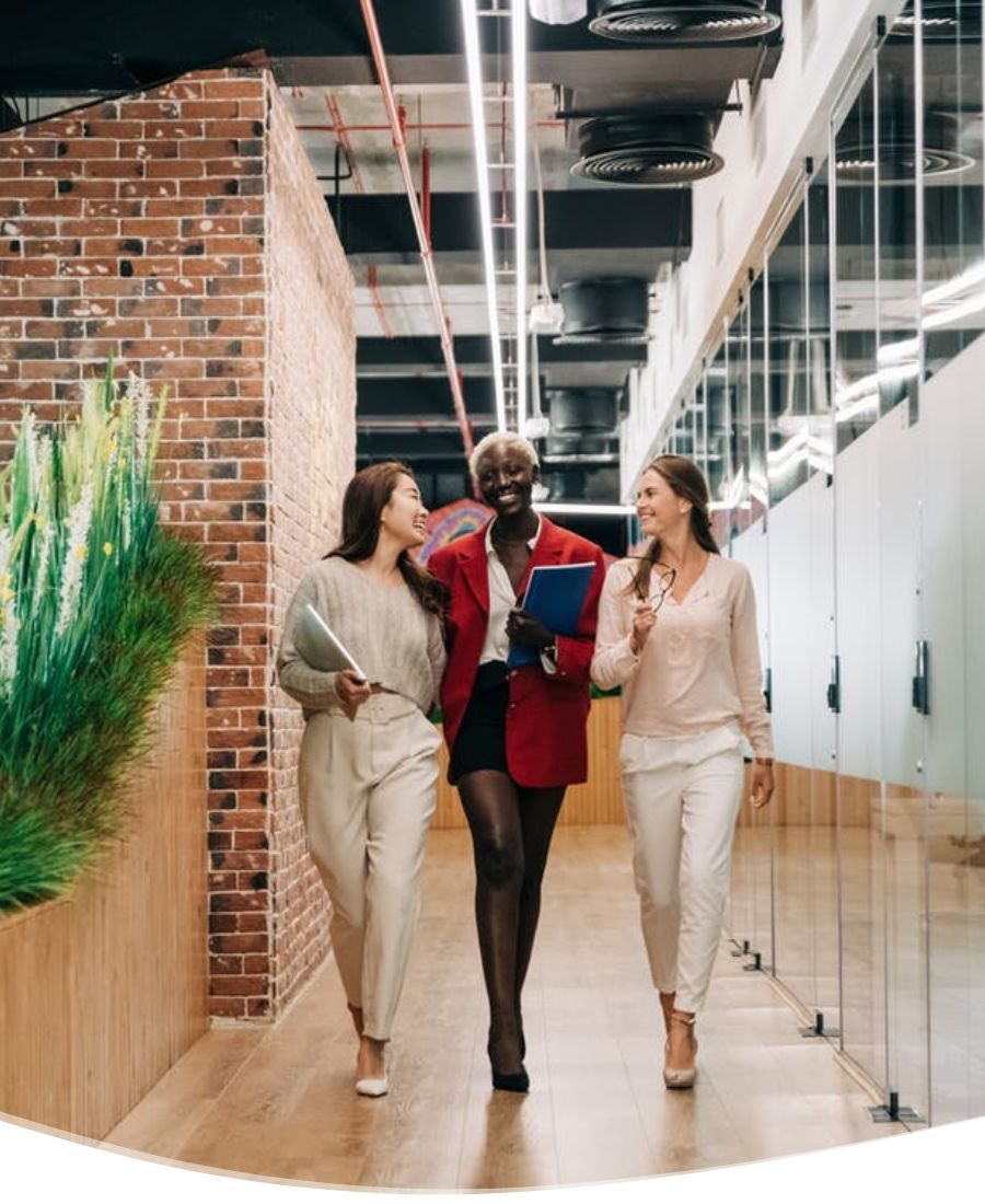 business women walking down hall