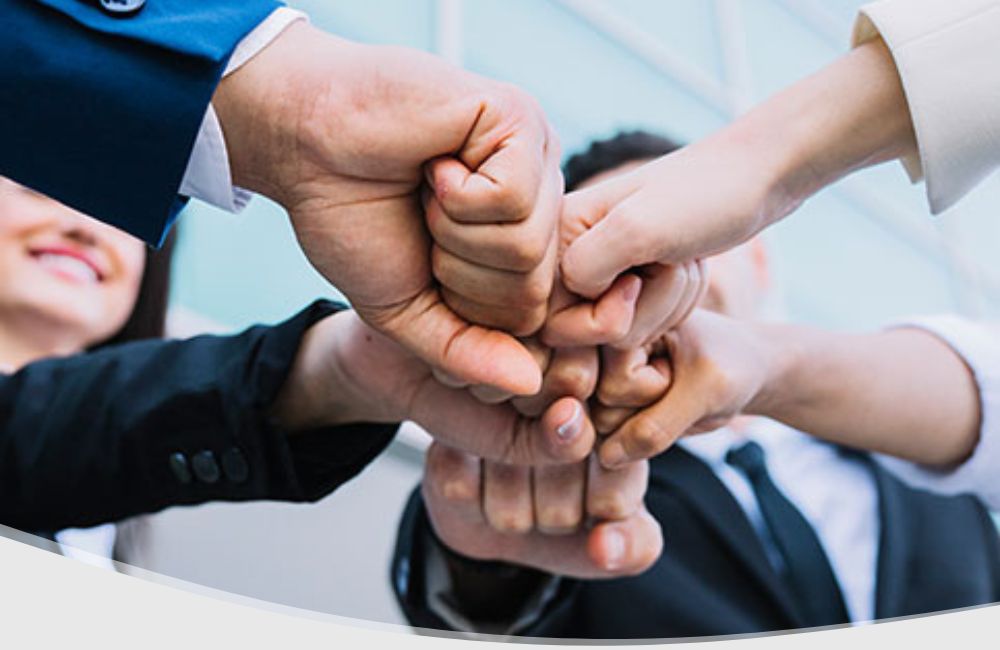 teamwork fist bumps