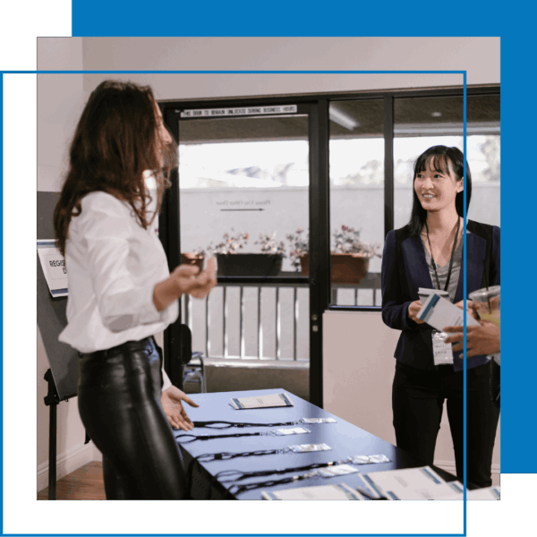 women talking in office